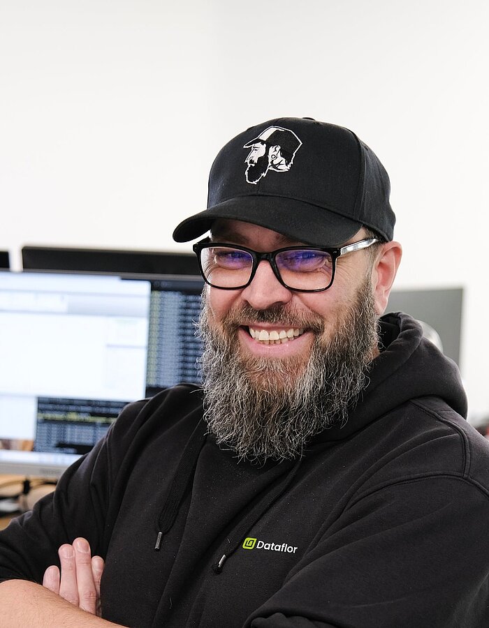 Mitarbeiter des Dataflor Support-Teams am Arbeitsplatz